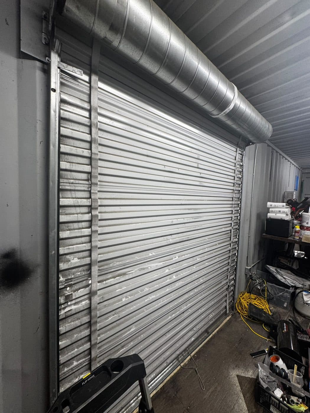 Commercial rolling steel door repair — after